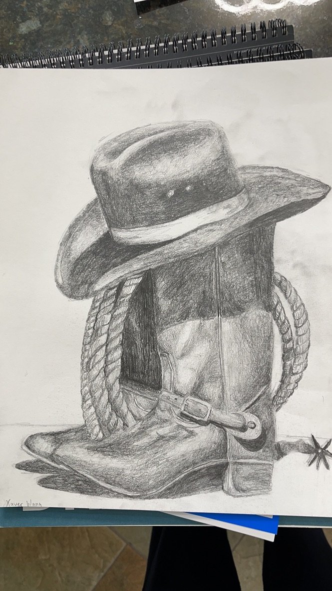 Xavier’s original pencil drawing of a hat and boot